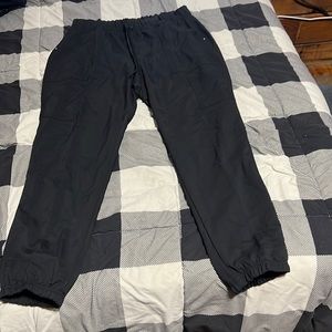 Scrub star elastic draw string waste with pockets.